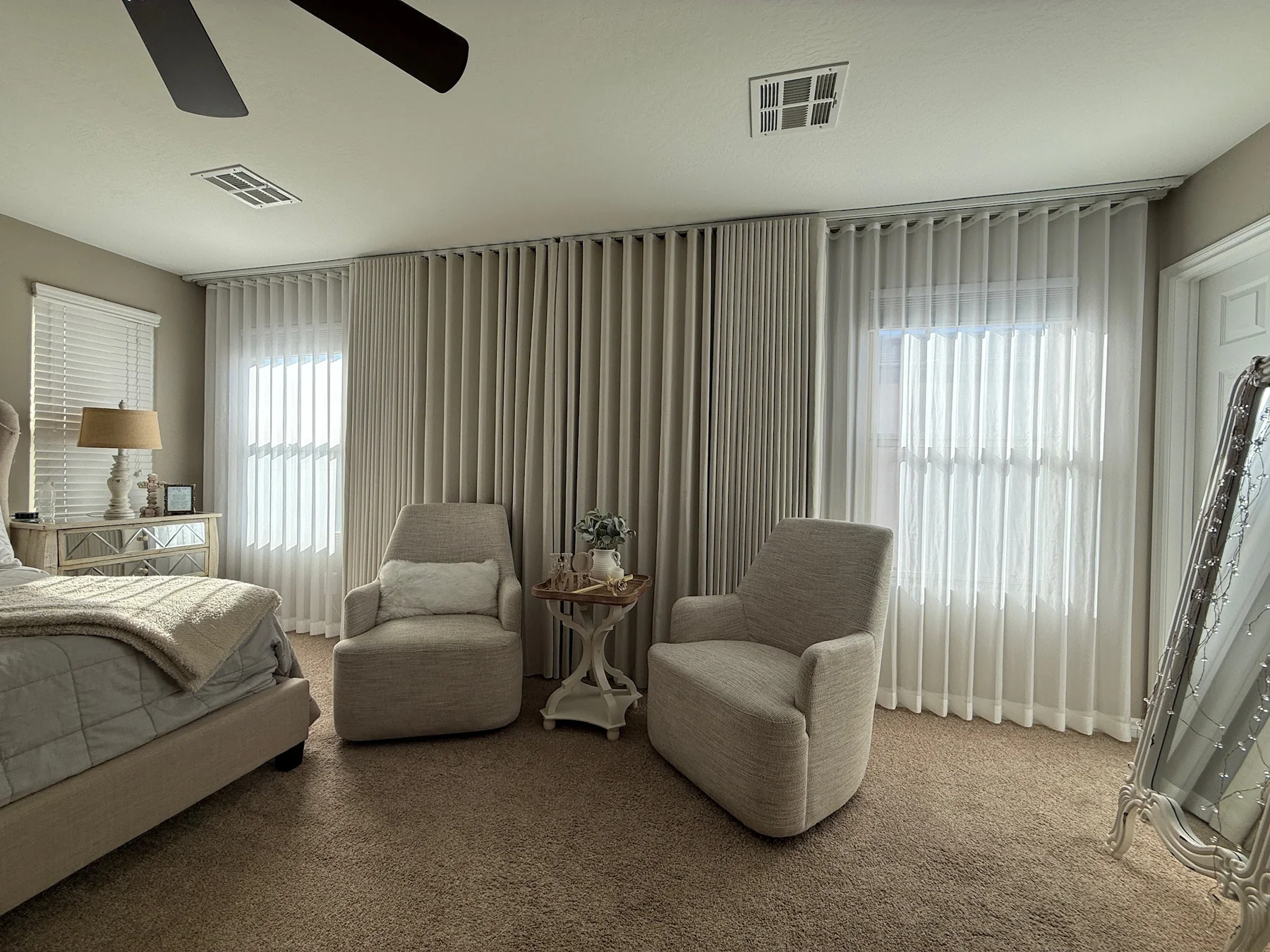 Custom layered drapery and sheers installed in a Las Vegas bedroom